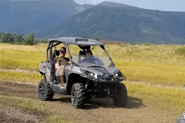 ATV on a field near the mountains
